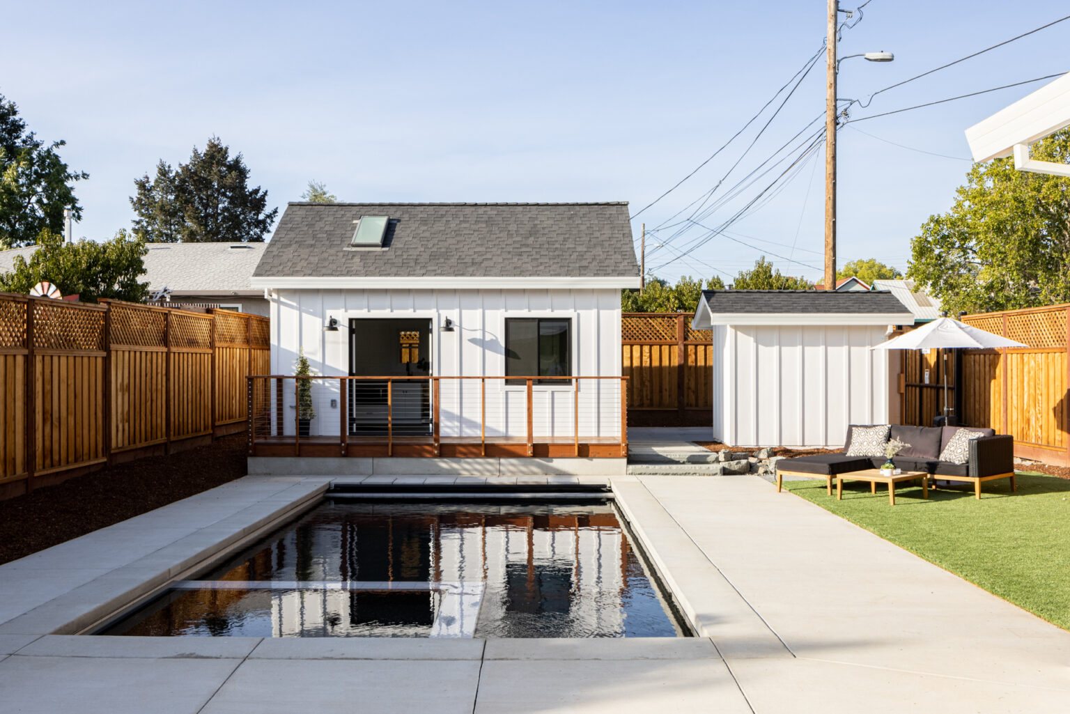 Backyard with pool and separate building